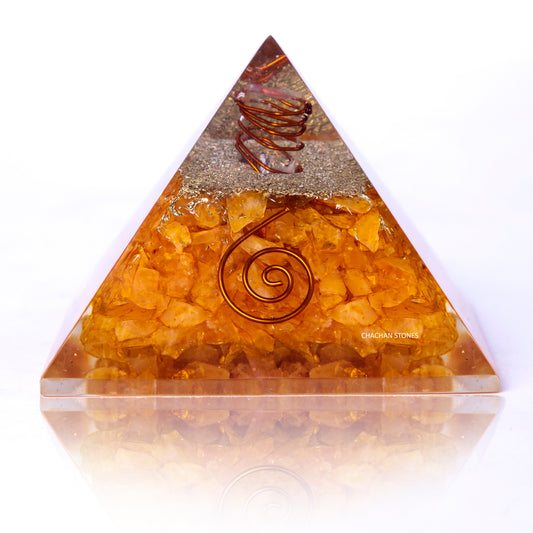 Triangular crystal pyramid with spiral design on a white background