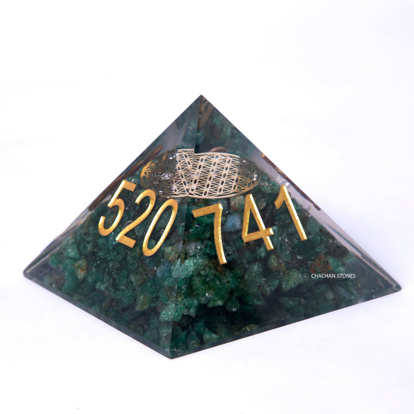 Pyramid-shaped stone with gold numbers '520741' on a white background