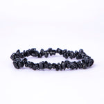 Black stone bracelet on a white background