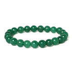 Green beaded bracelet on a white background