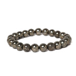 Pyrite beaded bracelet on a white background with 'Chachan Stones' branding.