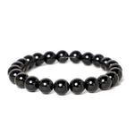 Black beaded bracelet on a white background