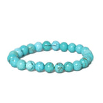 Turquoise beaded bracelet on a white background with 'Oceana Stones' branding.