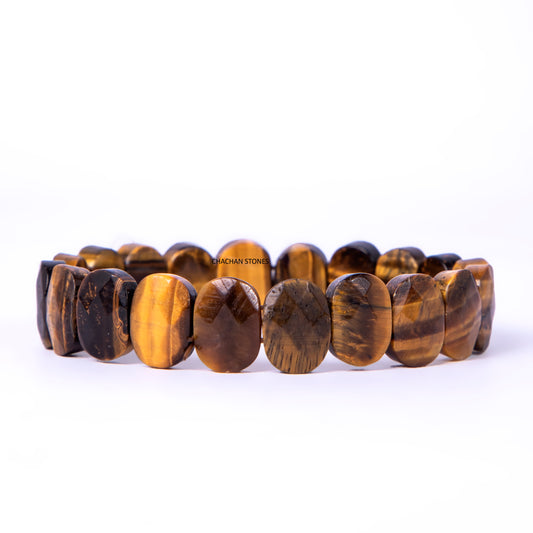 Brown beaded bracelet on a white background