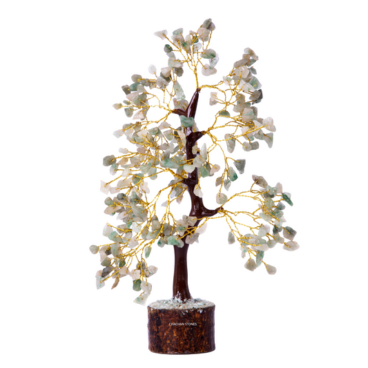 Decorative tree with lights and stones on a white background